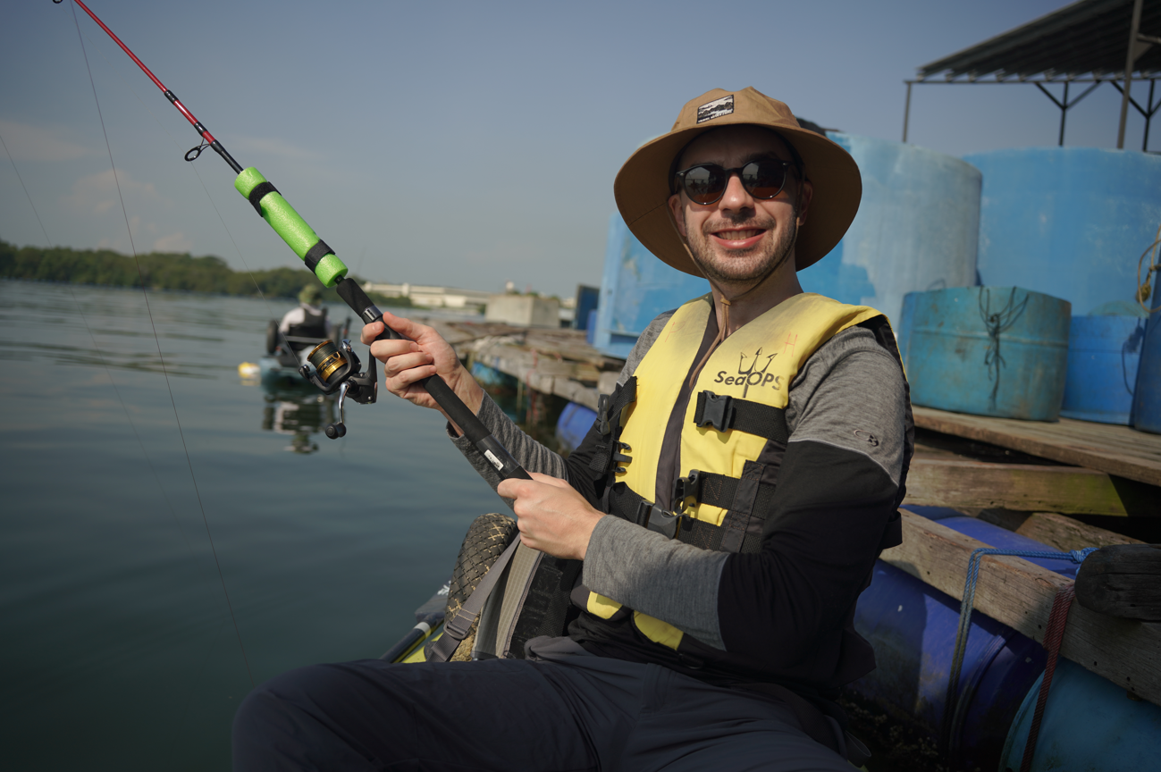 Guest poses for the camera on Purehybridz Kayak Fishing Tour