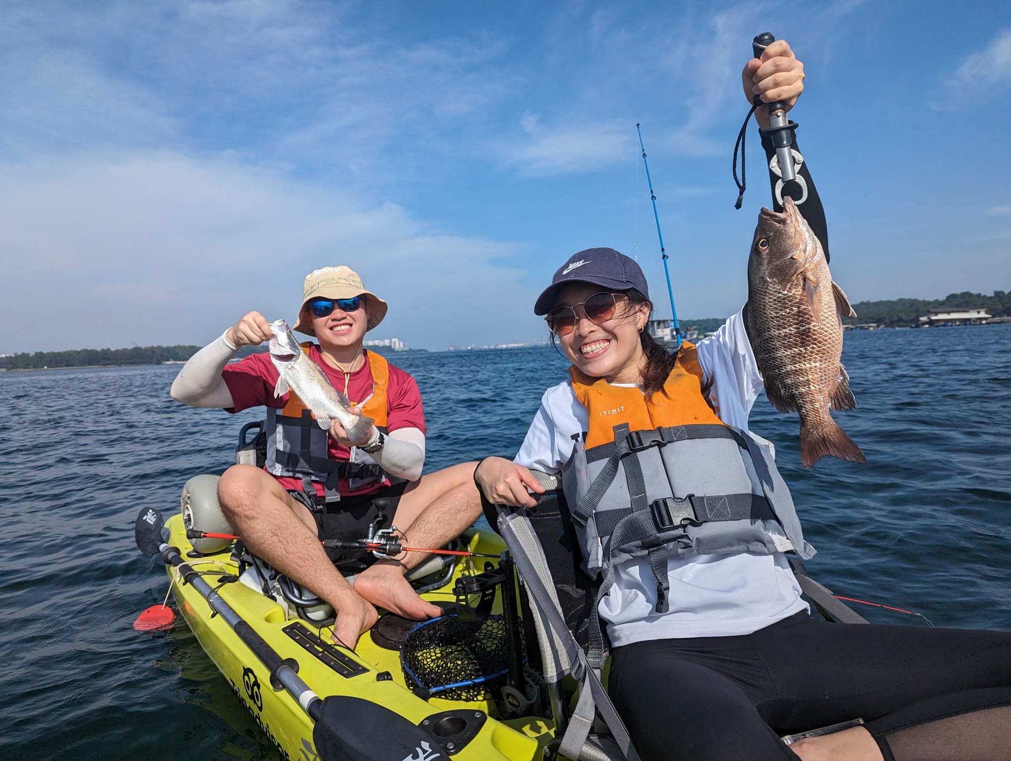 Purehybridz Kayak Fishing customers catches big mangrove jack on kayak Singapore