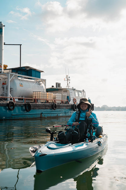 Kayak fishing guide Wayne onboard his blue Purehybridz Hobie Outback fishing kayak