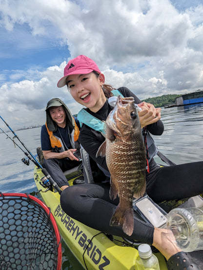 Lady angler catches huge mangrove jack on Purehybridz Kayak Fishing Tour 